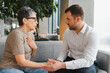 © Serhii - Psychologist offering support during a therapy session