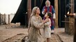 © AlfaSmart - Woman and kid in ancient biblical costume with man standing in background. Religious scene representing a holy family. Historical reenactment of traditional Middle Eastern life.