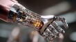© ประหยัด พลพวก - Robotic Hand's Futuristic Grasp: A gleaming metallic prosthetic hand, showcasing intricate internal mechanisms and transparent casing, extends its fingers in a delicate yet powerful gesture.