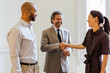 © BONNINSTUDIO/Stocksy - Business professionals shaking hands, sealing a partnership agreement