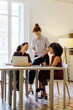 © BONNINSTUDIO/Stocksy - Female team collaborating on business project in office