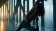 © BlackBridge Media - Woman Stretching in Modern Office with City View