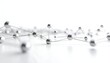 © Rika - Futuristic abstract background showing network connection structure with silver spheres and connecting lines