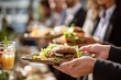© Genshin - Office Professionals Enjoying Gourmet Burgers at Outdoor Lunch Event