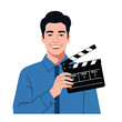 © Gallerie Creative - Young Man Holding Film Clapperboard for Movie Production.