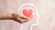 © Tin - A hand holding a heart inside a human silhouette, symbolizing the connection between love and mental well-being.