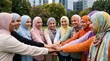 © Winaya Digital - Muslim Women Joining Hands Together - Unity and Teamwork