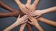 © THANHANATHAN - Diverse hands stacked together as a symbol of global unity with diversity equality togetherness inclusion collaboration teamwork connection