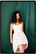 © Tania Cervian/Stocksy - Young woman posing in elegant white dress