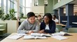 © mashimara - Diverse students collaborating on a project in a modern university library setting