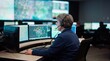 © AI-Universe - Reife Frau mit Headset arbeitet als Disponentin in einer dunklen Leitstelle vor mehreren Monitoren