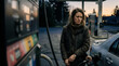 © SofiaPhoto - Commuter refueling a compact car at a neighborhood gas station at dawn, with rising fuel cost stress and a blurred pump display.
