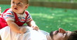 © Marco - Candid casual father and baby son interaction relationship lifting child hugging
