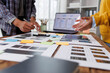 © David - Ux ui designers collaborating on mobile app wireframe development, planning creative workflow, brainstorming new application features, and prototyping user interfaces