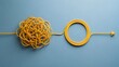 © Picart  - Complex to simple workflow concept with tangled yellow wire transforming into a neat circle and arrow symbolizing business organization and solution