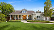 © Virtual House - Single story suburban ranch home with green siding and manicured lawn real estate curb appeal