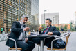© DZ FILM/Stocksy - Outdoor business meeting