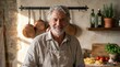 © Anay - Portrait of a smiling senior italian chef in a rustic kitchen, wearing an apron with flour, surrounded by cooking ingredients