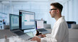 © Andrey Popov - Man Uses Laptop To Manage Patient Intake