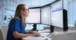 © Andrey Popov - Woman Using Credentialing Software On Desktop