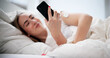 © Andrey Popov - Young Woman Rests On Bed While Checking Glucose Levels