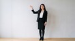 © Suvo Bepary - Helpful woman with hand raised for presentation, service concept, gesture pose