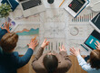 © Konstantin Yuganov - Business Team Analyzing AI Data Insights and Performance Metrics