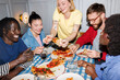 © Studio Firma/Stocksy - Sharing food and smiles