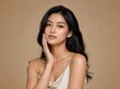 © aziseptian - Radiant asian woman touching her face in a beauty portrait