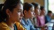 © WhataWin - Group of smiling female students studying together in a classroom, representing education, learning
