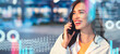 © Prostock-studio - Smiling Young Woman Talking On Smartphone In Urban Setting At Night, Engaged In Conversation With Joyful Expression, Representing Modern Communication And Digital Connection Concept.