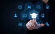 © Tech_Lab - Businessman touching a digital interface with education icons