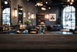 © Agil - blur background of a barbershop interior and wooden table on foreground for product