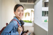 © Shisu_ka - Beautiful student asian woman with backpack and books outdoor. Smile girl happy carrying a lot of book in college campus. Portrait female on international Asia University. Education, study, school