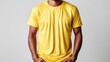 © svastix - A vibrant yellow t-shirt is displayed against a clean, minimalist backdrop, emphasizing its casual and contemporary style, ideal for everyday wear and fashion.