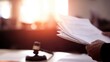 © tashechka - Court session with documents and a gavel in focus during morning hours
