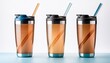 © Judith - Three Insulated Water Tumblers With Straws On A White Background
