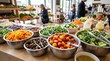 © photoplotnikov - Self service salad bar with fresh vegetables in stainless bowls on wooden counter inside busy market cafe, adults selecting ingredients for healthy midday lunch
