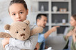 © Pixel-Shot - Sad little girl with toy bear at home, closeup. Divorce concept
