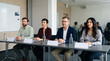 © InoStudiox - Participants assis à une table pendant une réunion ou une formation