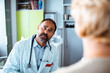 © Davor - Concerned doctor consulting patient in clinic