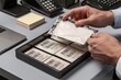 © TAlex - Investigator Handling Duplicate Barcode Blackout Sleeves for Retail Loss Prevention