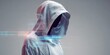 © mryanfahrudin1 - Anonymous figure in a white hoodie with digital overlay conceptual image
