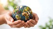© SUMAYA AKTHER - Hands holding a globe made of various healthy foods representing global food security and sustainable nutrition