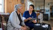 © Sugar Love Love - Nurse providing home healthcare to senior woman with tablet