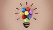 © Destina - Colorful crumpled papers forming lightbulb shape. 3D illustration