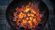 © Bilah - Barbecue grill contains burning charcoal embers providing a steady heat source for cooking various foods outdoors.