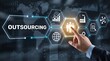 © Mary Patricia - A businessman touching outsourcing digital screen interface concept with modern icons and global network connection maps displayed across the glowing futuristic virtual display panel