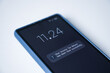 © Debalina - Income tax return has been filed successfully message on phone screen. Close-up, selective focus.