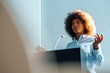 © Westend61 - Businesswoman gesturing giving speech at work place